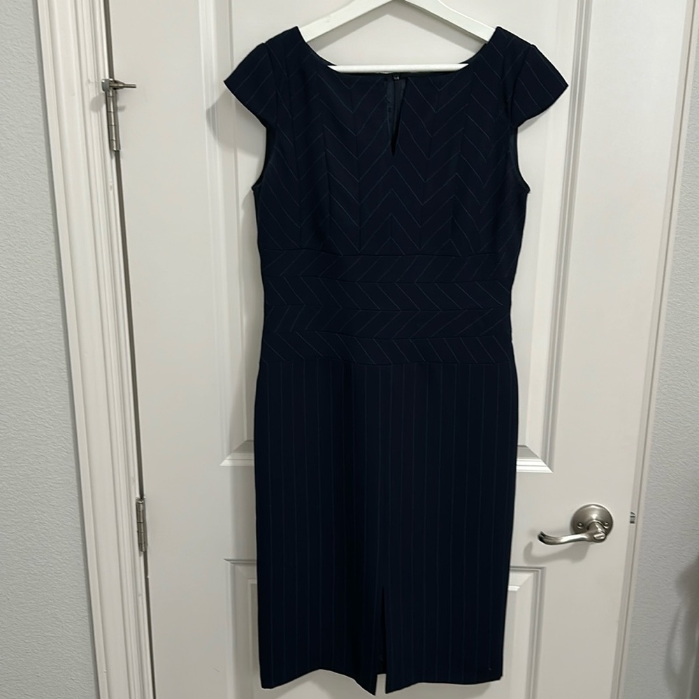 Oue Per Oue veste cap sleeve dress. Size 6. Navy with aqua blue stripes.